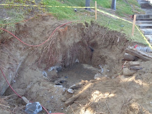 Removing Old Concrete Tank on Hillside